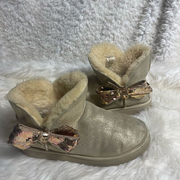 Ugg Mini Sequin Bow Bootie Gold Leather wool lining size10 - Picture 1 of 10